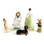 A collection of ceramic figures, to include a Wedgwood Dachshund, Royal Doulton enchantment collecti