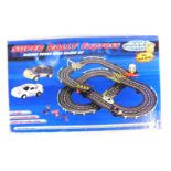 A Mega Motors Super Rally Express electric power road racing set, scale 1:43, catalogue no 372-4527,