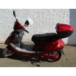 A Roadmaster E-Scooter electric bike, red, for off road use.