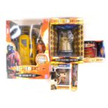 Various Doctor Who related items, comprising a Pop Television Tom Baker figure, diecast gold Dalek m