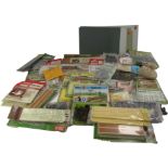 A quantity of OO gauge model railway accessories, to include lampposts, Airfix telegraph poles, Will