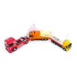 Remote control vehicles, including a Mercedes Benz Actros in TNT livery, Mercedes Benz 1838 Trans Ca