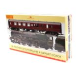 A Hornby OO gauge train pack BR Duchess of Sutherland and support coach, 4-6-2 BR Princess Coronatio