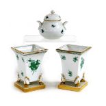 A pair of Herend porcelain vases, of trumpet form, raised on four paw feet and a square base, decora