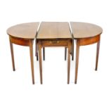 A George III oak D end dining table, the central table with drop flaps and a side drawer, all raised