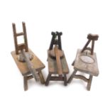 Three Chinese hardwood sugar cane presses, each with a table frame and juice channel with lip, two w