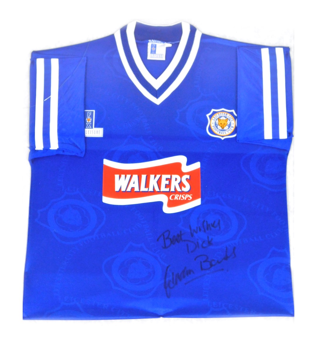 A signed Leicester City shirt, framed and glazed, 76cm high, 60cm wide,.