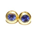 A pair of 18ct gold and amethyst stud earrings, one butterfly clip lacking, 3.9g.
