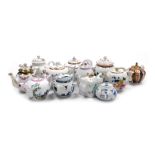 A Franklin Mint porcelain teapot collection, for the Victoria and Albert Museum, printed marks. (12)