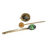 A Victorian stick pin, stamped 15ct, 1.6g, together with a silver and enamel hair slide, with floral