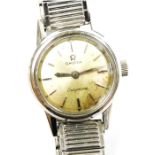 An Omega Ladymatic stainless steel cased wristwatch, circular champagne dial with batons, back engra