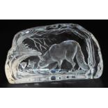 A Dartington Crystal Intaglio paperweight, designed by Alfred Capredoni, showing a fox and her cubs,