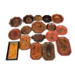 A group of Chinese lacquered wooden dishes, bowls, and comports, variously decorated. (a quantity)