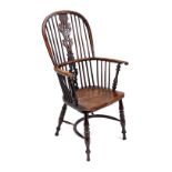 An early 19thC North Nottinghamshire yew and elm Windsor chair, probably from the Gabbitas workshop,
