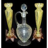 A pair of late Victorian slender vaseline glass vases, with baluster collars and tapered striped ste