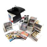 A Playstation 3, boxed, together with a six axis wireless controller, and various games, including D