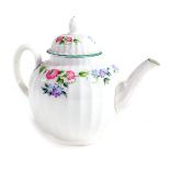 A Royal Worcester porcelain English Garden teapot, of fluted form, printed marks.