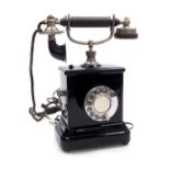 An early 20thC Jydsk dial telephone.