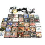 A Sony Playstation Dual Shock, SCPH-7502, boxed, together with assorted games, including Resident Ev