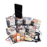 A Playstation 2, together with various games, including Grand Theft Auto, Run Like Hell, Exterminati