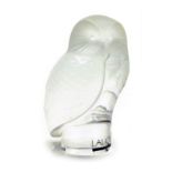 A Lalique frosted and clear glass figure of an owl, etched mark, 9cm high.
