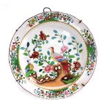 A late 19thC Copeland late Spode pottery plate, decorated with exotic birds and flowers, printed and