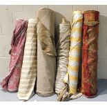 Six rolls of upholstery fabric, including stripes, floral and leopard skin patterns. Lots 351 to 45