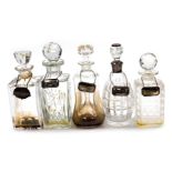Five Victorian and later cut glass decanters, including an hourglass decanter, and a decanter with a