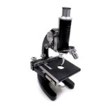 A Tasco Professional 2000X monocular microscope, registration no. 164225.