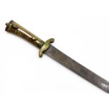 A Middle Eastern short sword, with an engraved brass cross guard, faux marble grip, and curved steel