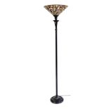 A Tiffany style uplighter, with a floral decorated shade, 177cm high.