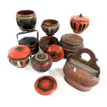 An assortment of Chinese wooden and lacquered storage pots, containers and buckets. (a quantity)