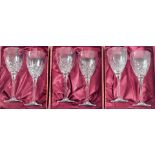 Six Royal Doulton crystal stemmed wine glasses, each boxed as pairs.