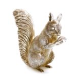 An Elizabeth II silver figure of a squirrel, modelled holding a nut, BSE Products London 2000, 6.62o