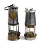 A miner's lamp, by the Wolf Safety Lamp Company (Wm Maurice) Limited of Sheffield, 17cm high, and a
