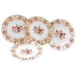 A set of four early 19thC Derby porcelain armorial plates, the central reserve decorated with the co