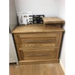 An oak two drawer chest. Note: VAT is payable on the hammer price of this lot at 20%.