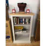 A painted bookcase. Note: VAT is payable on the hammer price of this lot at 20%.