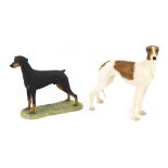 A Border Fine Arts Dog and Pup's Galore figure, of a standing brindle and white greyhound, together