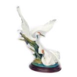 A Lladro figure group of two cranes, no. 01456, on oval base, 51cm high.