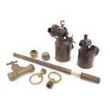 A group of copper and brass ware, comprising a Causeway Drake Norwich hub cap, brass tap, rings and