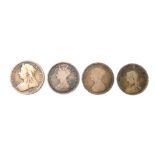 Four Victorian silver coins, comprising a half crown, dated 1911, and three florins, all rubbed,