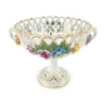 A 20thC Dresden porcelain two handled pedestal dish, the pierced bowl decorated with painted and app