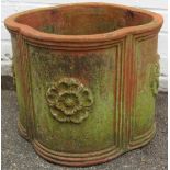 A terracotta planter, with Yorkshire Rose on four panelled design, 35cm high, 42cm wide.