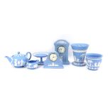 A group of Wedgwood blue Jasperware, to include mantel clock, with Roman numeric dial, quartz moveme