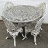 A metal Coalbrookdale style circular garden table and four chairs, each of pierced and scroll design