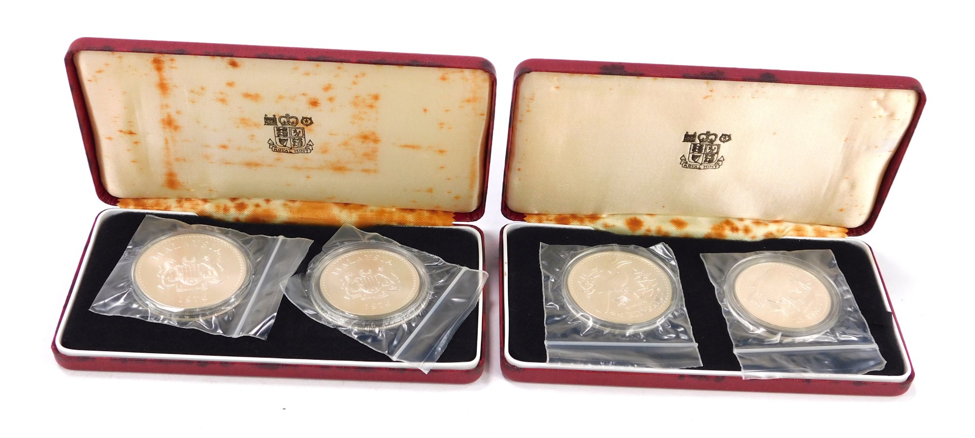 Two cased sets of silver proof Malaysian coins, issued by The Royal Mint, dated 1976, 25 Ringgit and