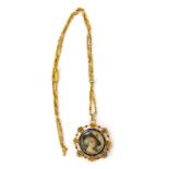 An 18ct gold Edwardian pendant and chain, the pendant set with seed pearls and diamonds, red and blu