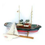 A kit built remote controlled fishing boat, Bugseir 3, and a Star mark 1 pond yacht. (2)