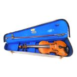 An early 20thC two piece violin, 57cm long, unsigned, with bow, contained in a case for Rushworth an
